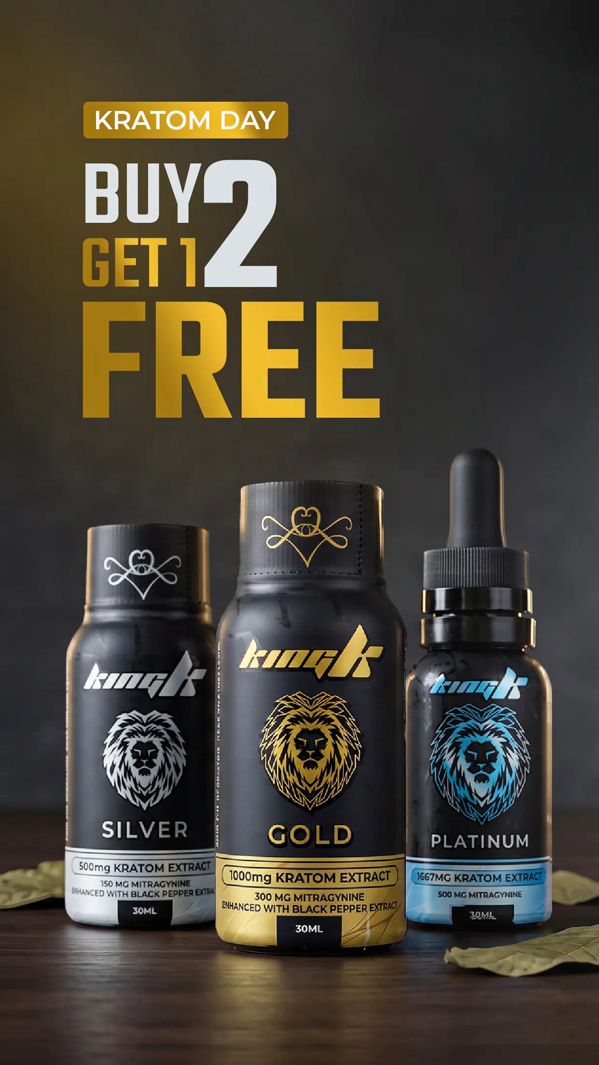 Three bottles of KunLiz kratom extract displayed on a dark wooden surface against a dark background, with a large promotional text overlay reading 'KRATOM DAY BUY 1 GET 2 FREE'. The bottles are labeled Silver, Gold, and Platinum.
